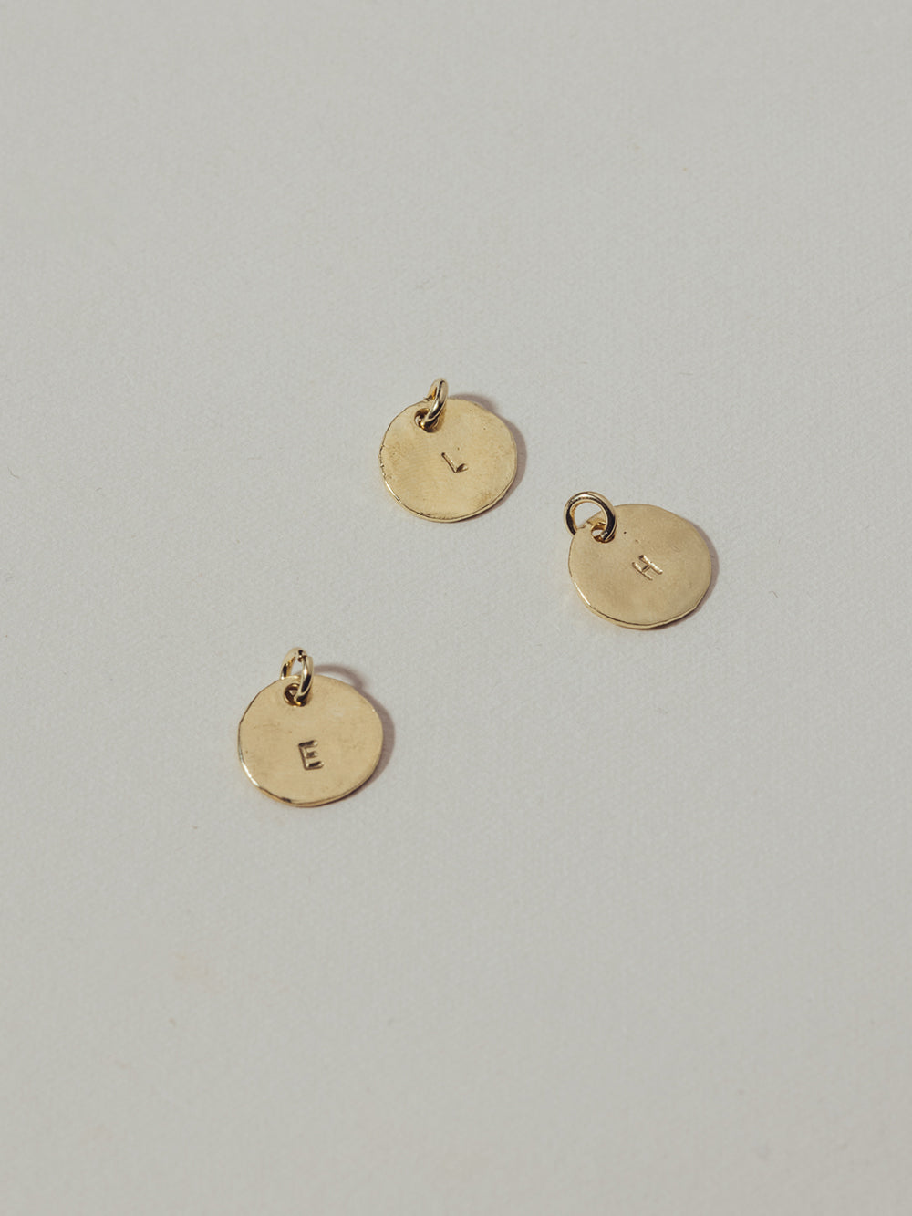 Add an extra coin L | 14K gold plated